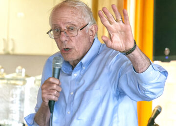 Senator Bernie Sanders gestures while speaking at the Gateway Center in Newport.