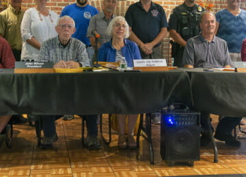 Members of the Newport City Council seated at a table at their August 7 meeting.