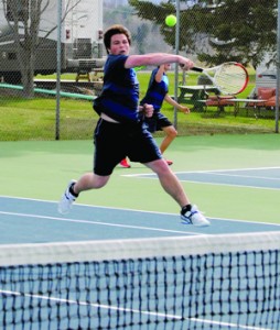 Falcon Thomas Durivage has earned his spot as the number two tennis player for the North Country tennis team.  Coach Gary Atchinson credits seniors like Durivage for providing a steadying influence for his relatively inexperienced team.   Photo by Richard Creaser 
