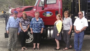 The town of Brownington got a new truck with the help of a $50,000 matching grant from the USDA.  From left to right are Brownington road foreman Leonard Messier, Town Clerk Cheryl Galipeau, select board Chairman Beverly White, Misty Sinsigalli of the USDA, grant writer Jan Delaney, and selectman Terry Curtis.  Photo by Elizabeth Trail