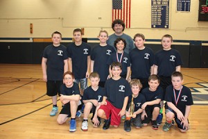 The Irasburg boys team is pictured.  In the front row, from left, are Donovan Barton, Cy Boomer, Logan Ingalls, Owen Brochu, Christian Poutre, and Landyn Leach.  In the back row:  Tyler Jewer, Josh Cole, Isaiah Brochu, Wyatt Gile, Ryan Moulton, and Tyler Goodridge.  At back center stands Coach Phil Brochu.  Photos by David Dudley