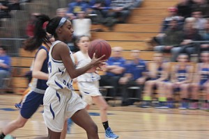 Tyrah Urie, who led all scorers with 25 points, gets out on the break.  “I've been focusing on finishing at the basket,” Urie said.  “So tonight I worked really hard on finishing.”  Photos by David Dudley
