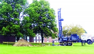 Drilling began on Friday for a new water well at Lake Region Union High School.  As of Tuesday morning, H.A. Manosh was still drilling.  A big pile of dirt shows that progress is being made.  Photo by Elizabeth Trail
