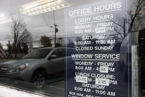 The Post Office in Craftsbury Common has strange hours these days.  Residents say they are inconvenient, but the USPS says decreasing hours is the only way to keep some of these offices open. Photos by David Dudley