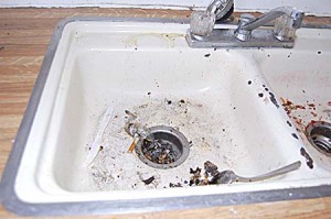 The water in the trailer doesn’t work, and the kitchen sink is full of cigarette butts.  