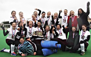 The Division III State Champion Falcons.  In the top row, from left to right:  Steph Tarryk, Jess Buckles, Alexis Bussiere, Kate Patenaude, Hayley Young, Brittany Fortier, Mariah Gentley, Morgan Greene, Aimie Morse, and Coach Chantelle Bouchard.  In the bottom row are:  Phoenix Alix, Kendra Fecteau, Kaitlyn Young, Adrianna Fournier, Kortni Driver, Brittany Royer, Bayla Stewart, Brianne Tetreault, Bethany Desrochers, and, lying down, Bailee Desrochers.   Photo by Chantelle Bouchard