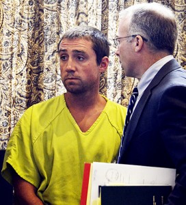 Ryan Bacon (left) and his lawyer, Jon Valsangiacomo, in Orleans Superior Court shortly after Mr. Bacon pled innocent to a first-degree murder charge in the shooting death of his grandfather Lou-Ron Schneider.  Police say Mr. Bacon shot Mr. Schneider Sunday after a quarrel over his grandfather’s relationship with his mother.  Photo by Joseph Gresser