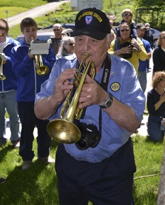 Pete Cocoros, veteran, trumpeter, and photographer, plays “Taps” in Glover on Memorial Day, 2013.  Photo by Bethany M. Dunbar