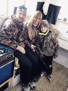 Duane Bowen, Tammy Lee Morin and their daughter Dakotah make “shanty life” pretty appealing. In the photo, Tammy Lee jigs through a hole in the floor, Dakotah gets ready to head out and skate, and the thermometer on the shelf reads 86 degrees inside, 18 degrees outside.  "It's a family thing," said of this lifelong pastime. 