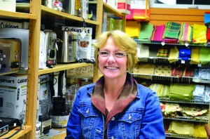 At All About Home in Derby, Cindy Moylan stocks high-end merchandise and matches online prices.  The strategy brings in business, but leaves her with a limited profit margin and makes it hard to add staff for the store, she said.  Photos by Joseph Gresser