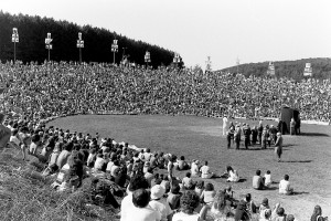 This is a shot of the circus and the crowd at Bread and Puppet from the August 17, 1983, edition of the Chronicle.  The photo accompanied an article that wrote about the fact that show goers left almost no litter behind after the circus weekend, despite a crowd estimated at 15,000 on each day.  File photo
