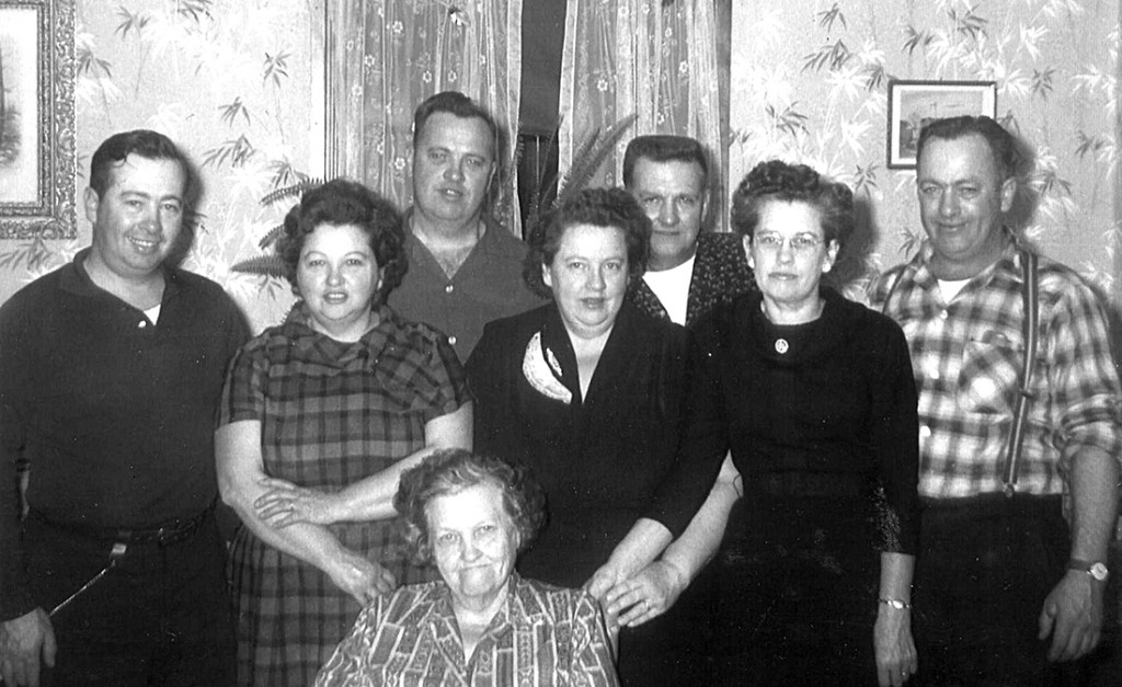 Pictured above, from left to right, in the first row are:  Donald Perron, Norman Perron, Rene Perron, and Roger Perron.  In the second row are:  Mamie Pudvah, Blanche Benway, and Adrienne Kells;  Noellia Morency Perron is in the front.  Photo courtesy of Valerie Benway Gaboriault