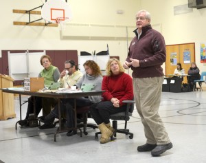 Bill Stenger addresses the Jay Town Meeting about changes at Jay Peak.  Photo by Bethany M. Dunbar